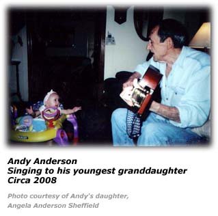 Andy Anderson sings to his granddaughter
